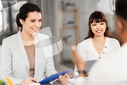 Image of recruiters having job interview with employee