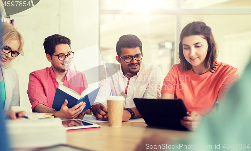 Image of group of high school students with tablet pc