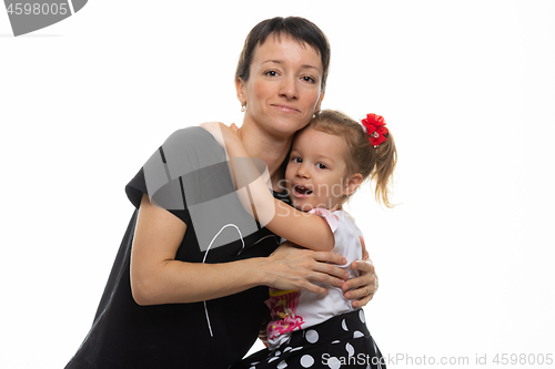 Image of Mom and daughter hugged each other, isolated on a white background