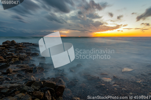 Image of The waves rolling ashore with the help of long-lasting