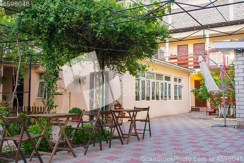 Image of The courtyard space of a small private hotel, a common plan