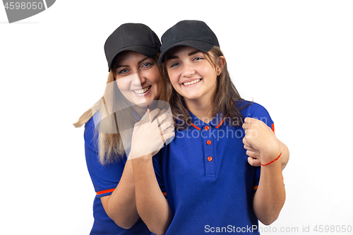 Image of Portrait of two happy women, mother and daughter in blue T-shirts
