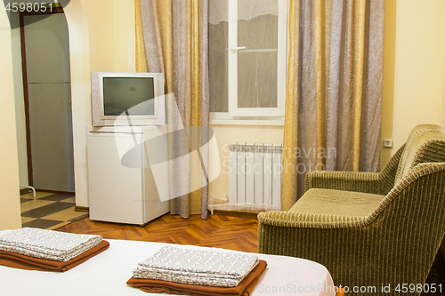 Image of The interior of an ordinary room in an inexpensive hotel