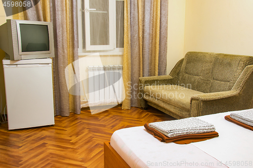 Image of The interior of a small hotel room