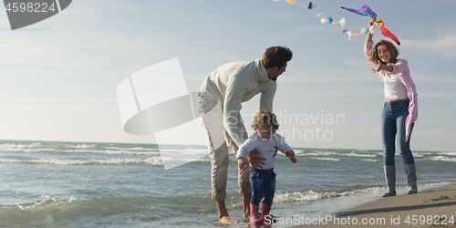 Image of Young family enjoying vecation during autumn