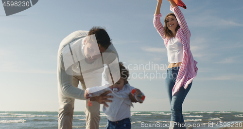 Image of Young family enjoying vecation during autumn