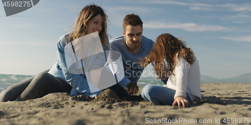 Image of Young family enjoying vecation during autumn