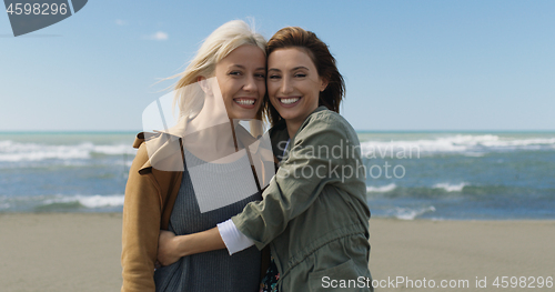 Image of Women Smiling And Enjoying Life at Beach