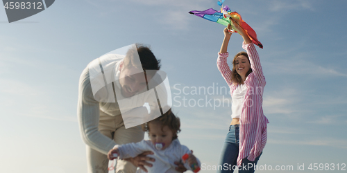 Image of Young family enjoying vecation during autumn