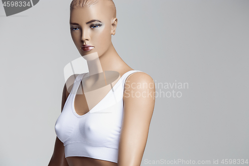 Image of The female mannequin over gray studio background