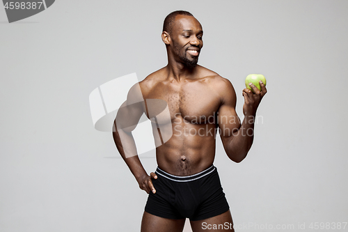 Image of Fit young man with beautiful torso isolated on white background