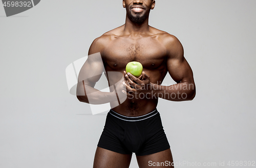 Image of Fit young man with beautiful torso isolated on white background