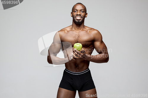 Image of Fit young man with beautiful torso isolated on white background