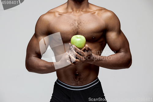 Image of Fit young man with beautiful torso isolated on white background