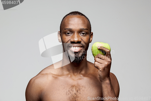 Image of Fit young man with beautiful torso isolated on white background