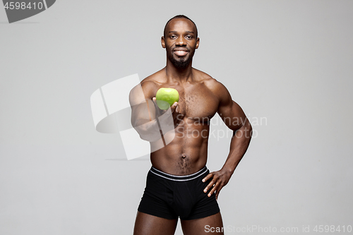 Image of Fit young man with beautiful torso isolated on white background