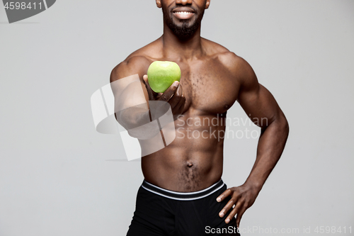 Image of Fit young man with beautiful torso isolated on white background