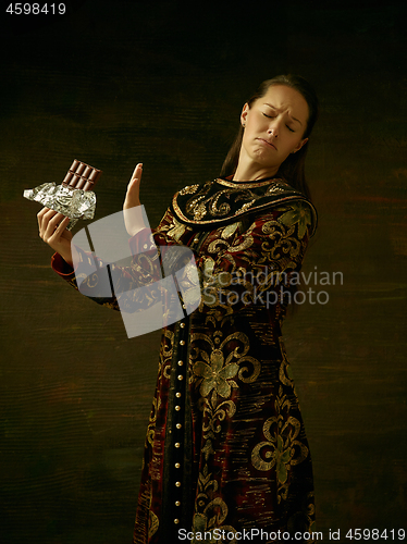 Image of Girl standing in Russian traditional costume.