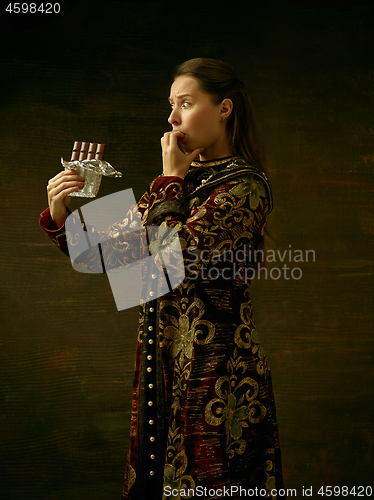 Image of Girl standing in Russian traditional costume.