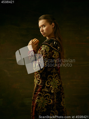 Image of Girl standing in Russian traditional costume.