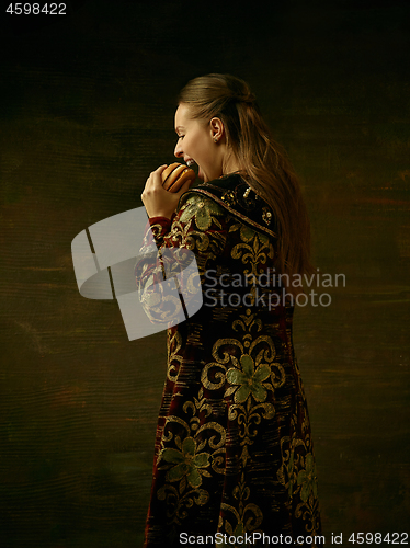 Image of Girl standing in Russian traditional costume.