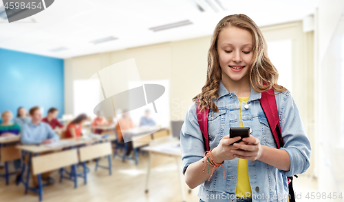 Image of teen student girl with school bag and smartphone