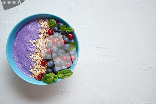 Image of Healthy food concept. Fresh fruit Blackberries and currants yogu