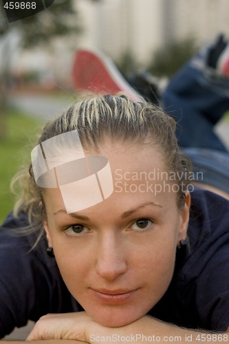Image of woman relaxing in the park
