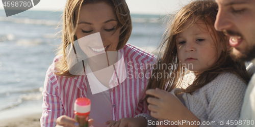 Image of Young family enjoying vecation during autumn