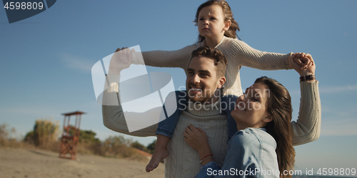 Image of Young family enjoying vecation during autumn