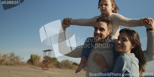 Image of Young family enjoying vecation during autumn