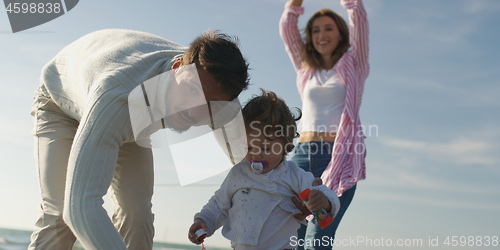 Image of Young family enjoying vecation during autumn