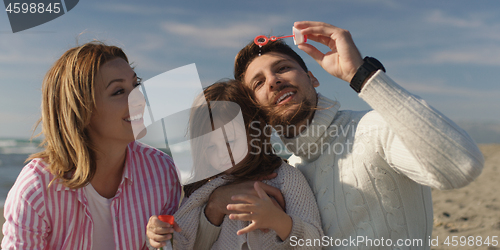 Image of Young family enjoying vecation during autumn