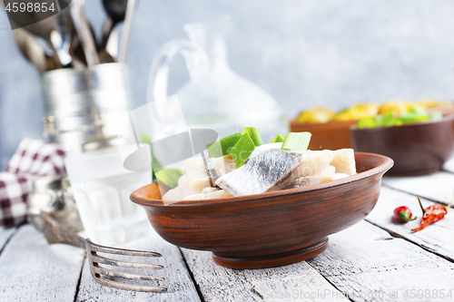 Image of herring with potato