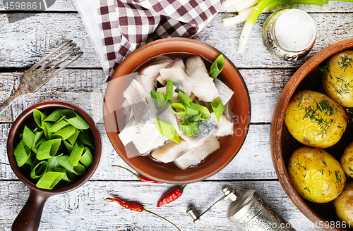 Image of herring with potato