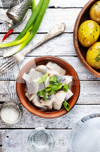 Image of herring with potato