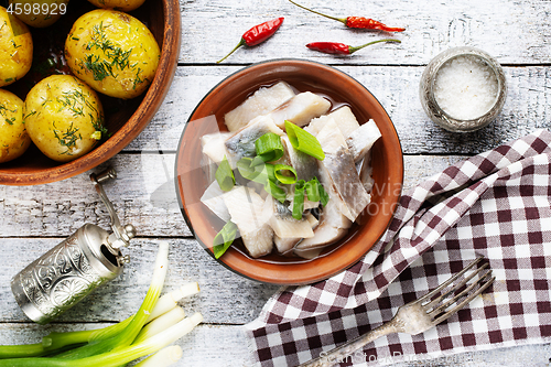 Image of herring with potato