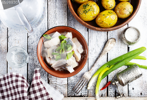 Image of herring with potato