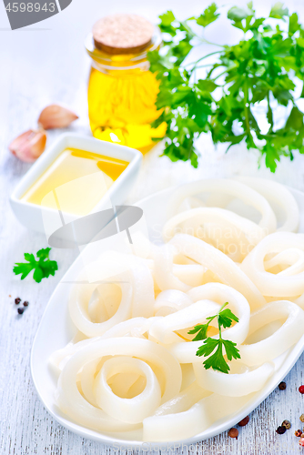 Image of Raw squid rings with pepper