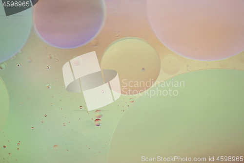 Image of Defocused pastel colored abstract background picture made with oil, water and soap