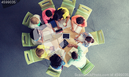 Image of group of students with tablet pc at school library