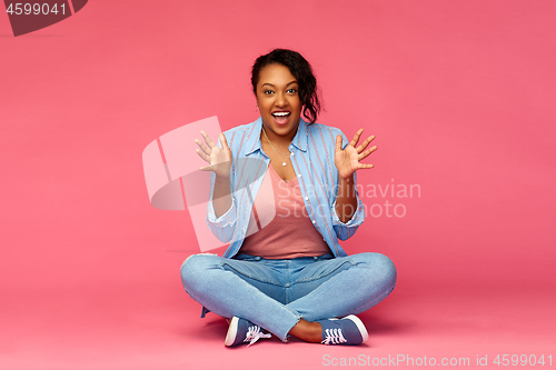 Image of happy excited african american woman