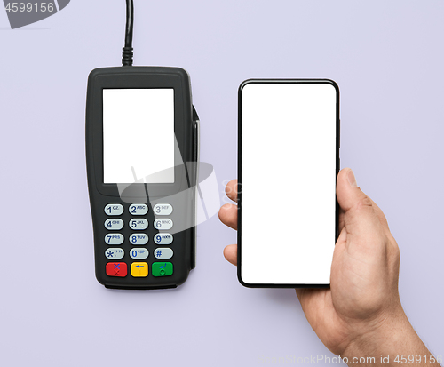 Image of Contactless payment for paying by smartphone with nfc technology