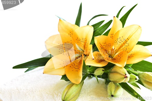 Image of Stack of towels with flowers