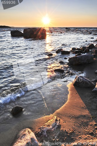 Image of Sunset over water