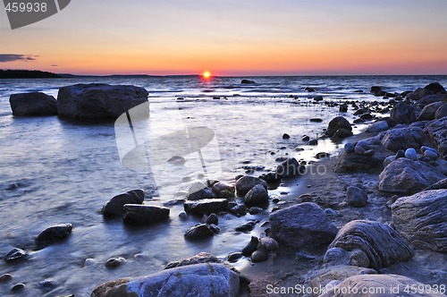Image of Sunset over water