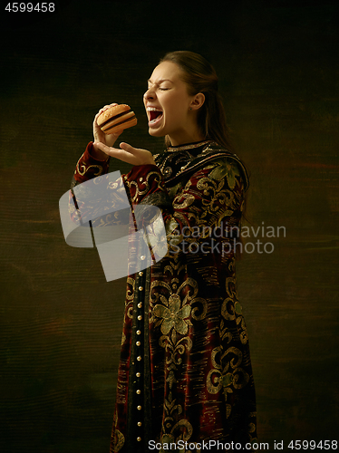 Image of Girl standing in Russian traditional costume.