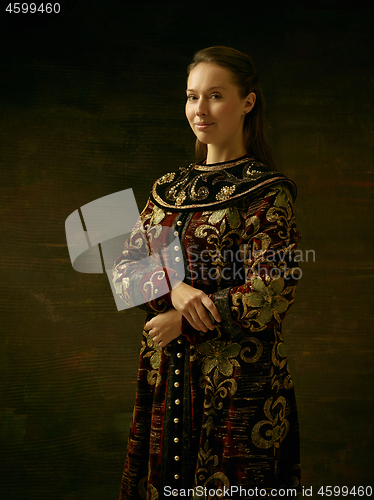 Image of Girl standing in Russian traditional costume.