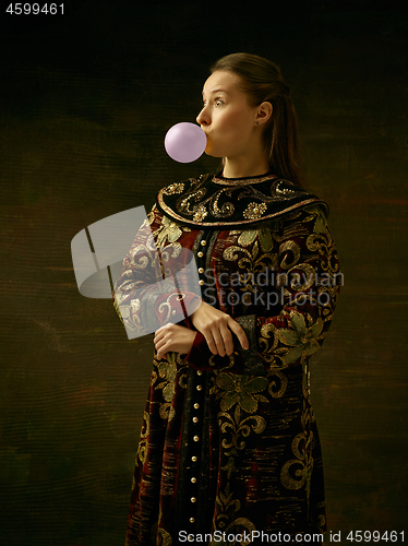 Image of Girl standing in Russian traditional costume.