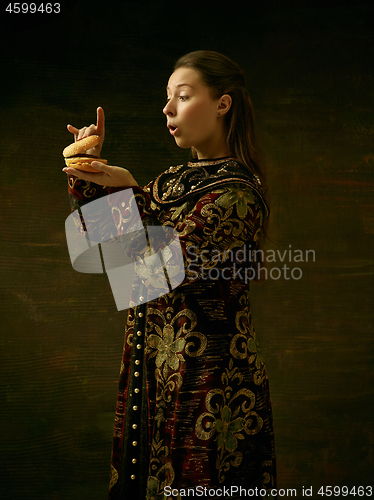 Image of Girl standing in Russian traditional costume.